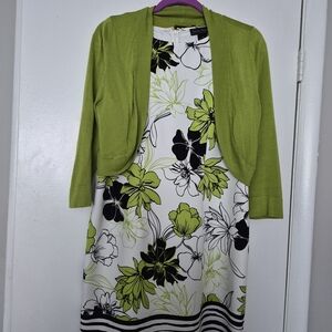 Floral Sleeveless Dress with Black and Green Accents And Green Sweater